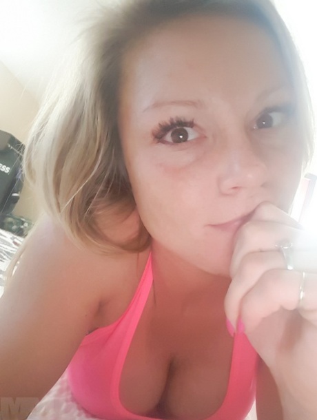 Amateur model takes naked and non naked bathroom selfies in mirror