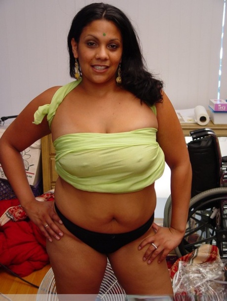 Indian BBW has sex with two men at the same time on a couch