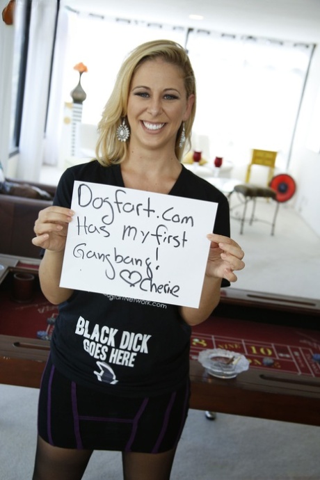 Hot blonde Cherie Deville lives out her interracial gangbang dreams