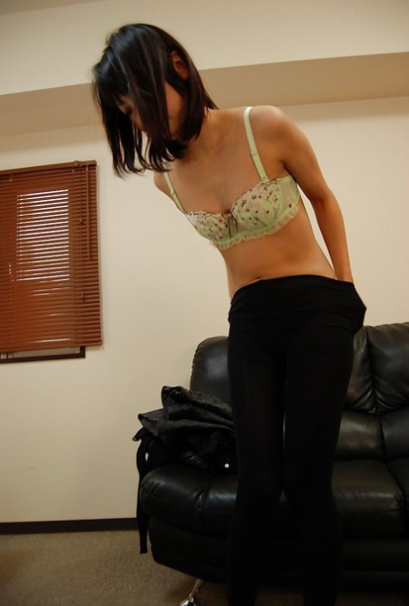 Filthy asian MILF Tomoe Kasai stripping and playing with sex toys