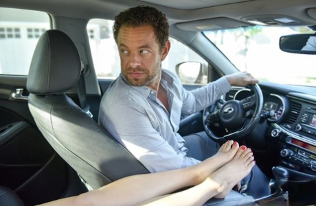 Sharon Lee gives her chauffeur an arousing footjob after a foot fetish licking
