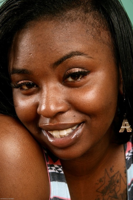 Chubby amateur Chocolate strips & shows her big tits & hairy ebony holes